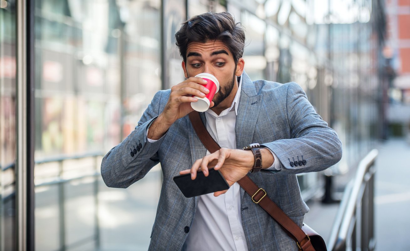 Man realizing he has a last-minute meeting