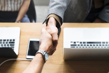 shaking hands after getting hired